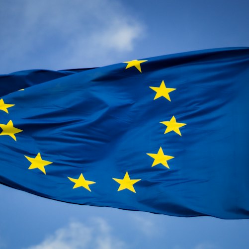 European Union flag outside the European Parliament in Brussels, used as an illustrative image; not a photograph of the October 2026 summit.