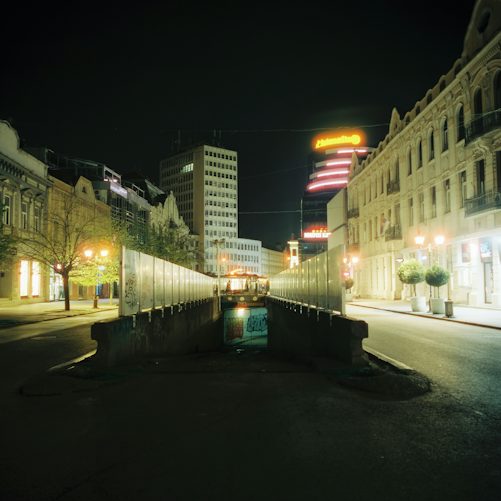 Illuminated street in a Serbian city at night, an illustrative photograph; not a scene from the 25 October 2026 parliamentary election.