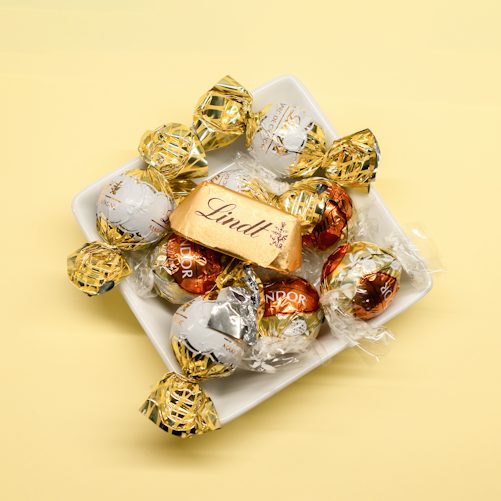 Assorted Lindt Lindor chocolates in an illustrative photograph; not the 24 October 2026 management interview.