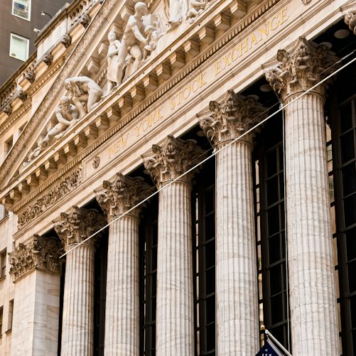 Exterior of the New York Stock Exchange, illustrating the public equity market; not the Anthropic IPO listing or an event photograph.