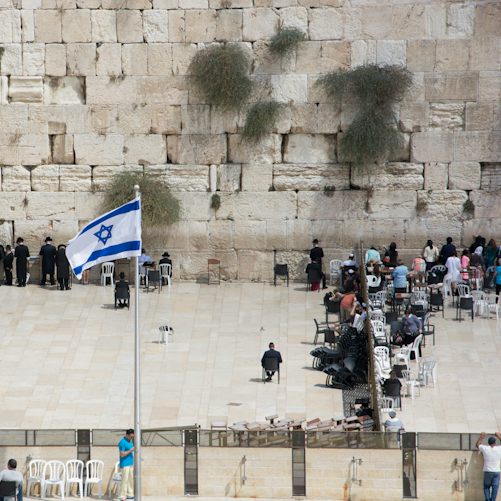 Israeli flag on a pole, a general illustration of Israel’s parliamentary election rather than a polling station or candidate event.